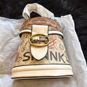 Cream and Tan Printed Bucket Bag with Gold Accent